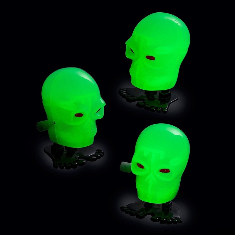 GLOW IN THE DARK SKULL WIND UP TOY