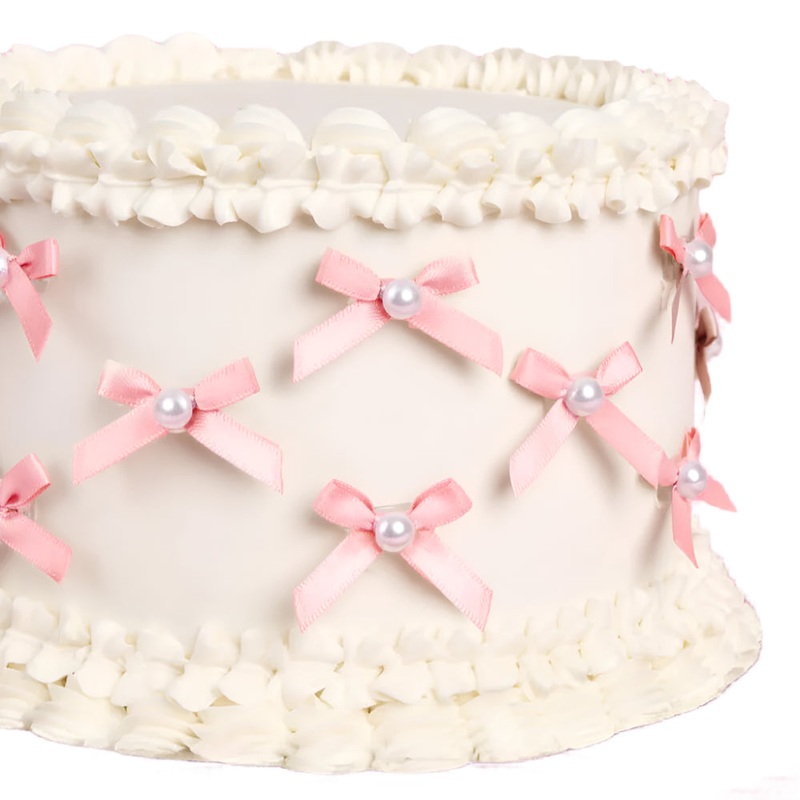 PINK & PEARL BOW CAKE TOPPERS